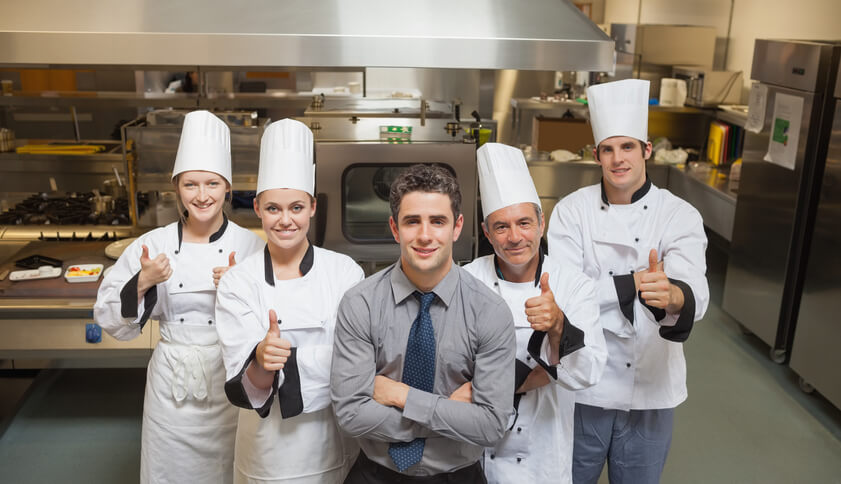 A team of local food business being happy for awarded for their food quality.